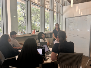 In preparation for the IB Psychology Exam on May 7 and 8, students go over key terms at a study session in the Otto G. Richter Library at the university of Miami, hosted by the IB Executive Council. 